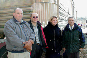 Matthew Alldredge, Laurentiu and Mandy Traineanu and town manager Robert Forguite welcome the arrival of the Royal Diner on March 1, 2002